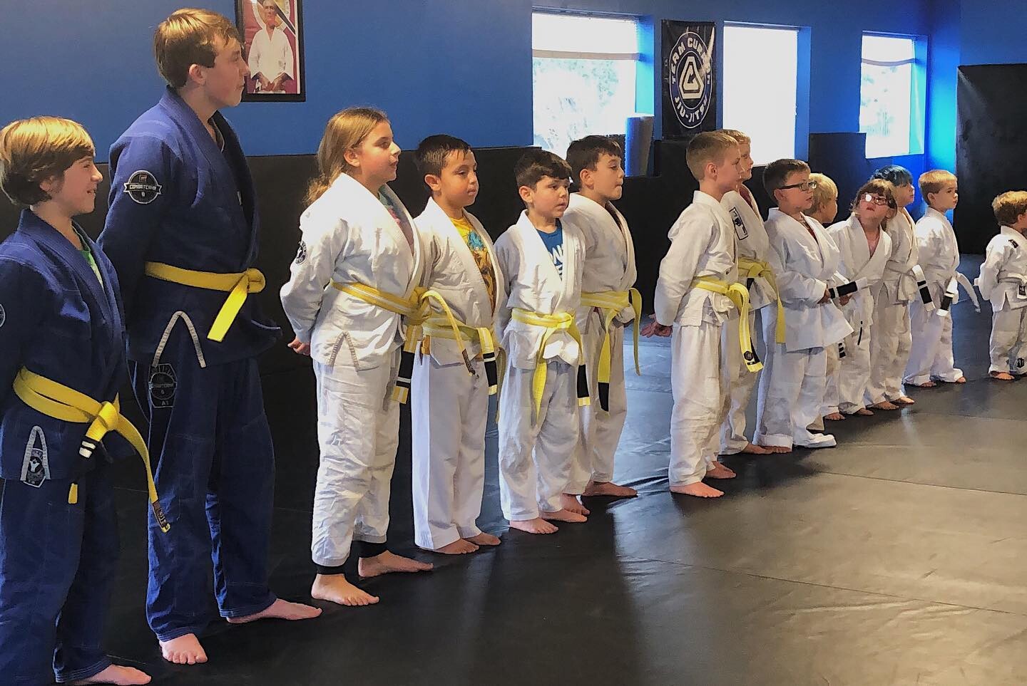Kids martial arts class training on the mats at Team Haanpaa